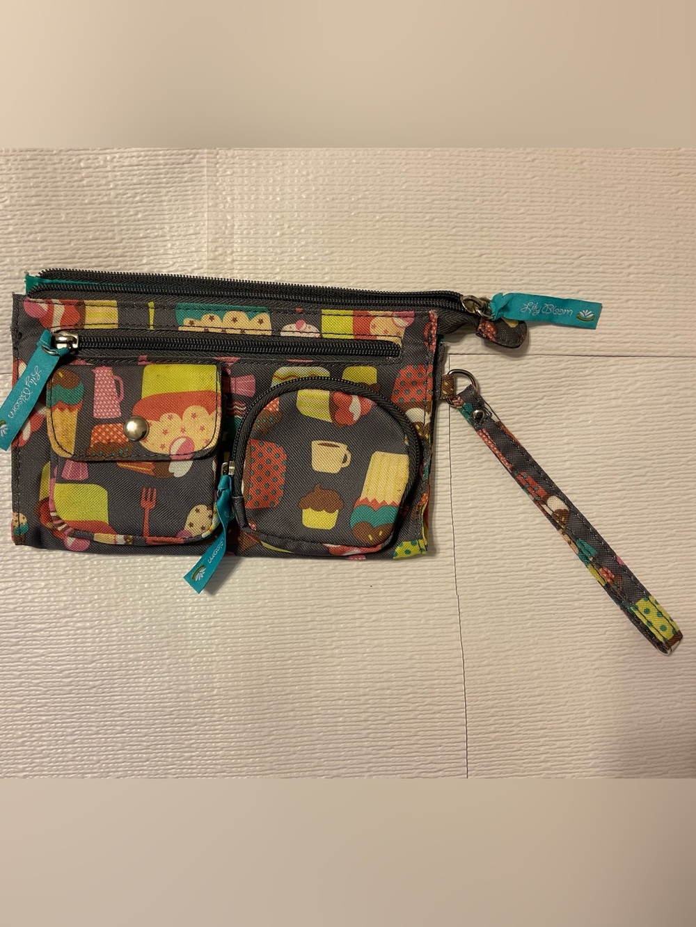 Lily Bloom Wristlet Pouch in Gray with Colorful Dessert Print